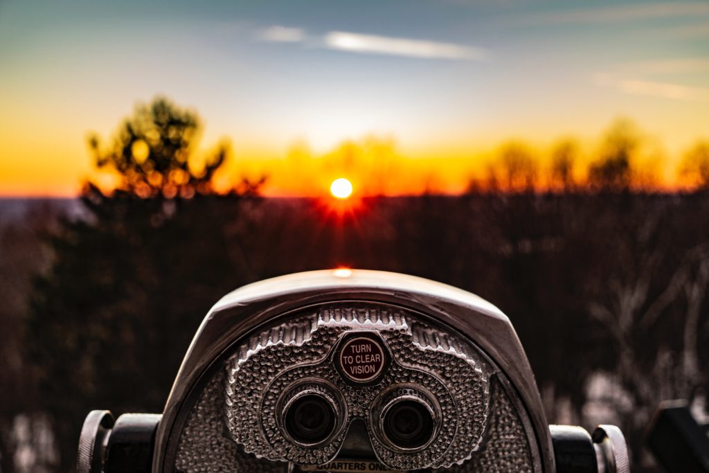 selective focus photo of silver tower viewer telescope facing sunshine You can change if you have the vision.