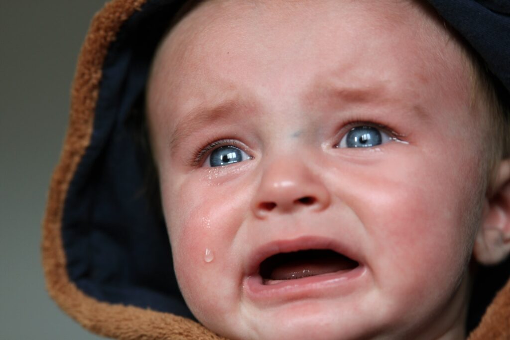 Close-up Photo of Crying Baby